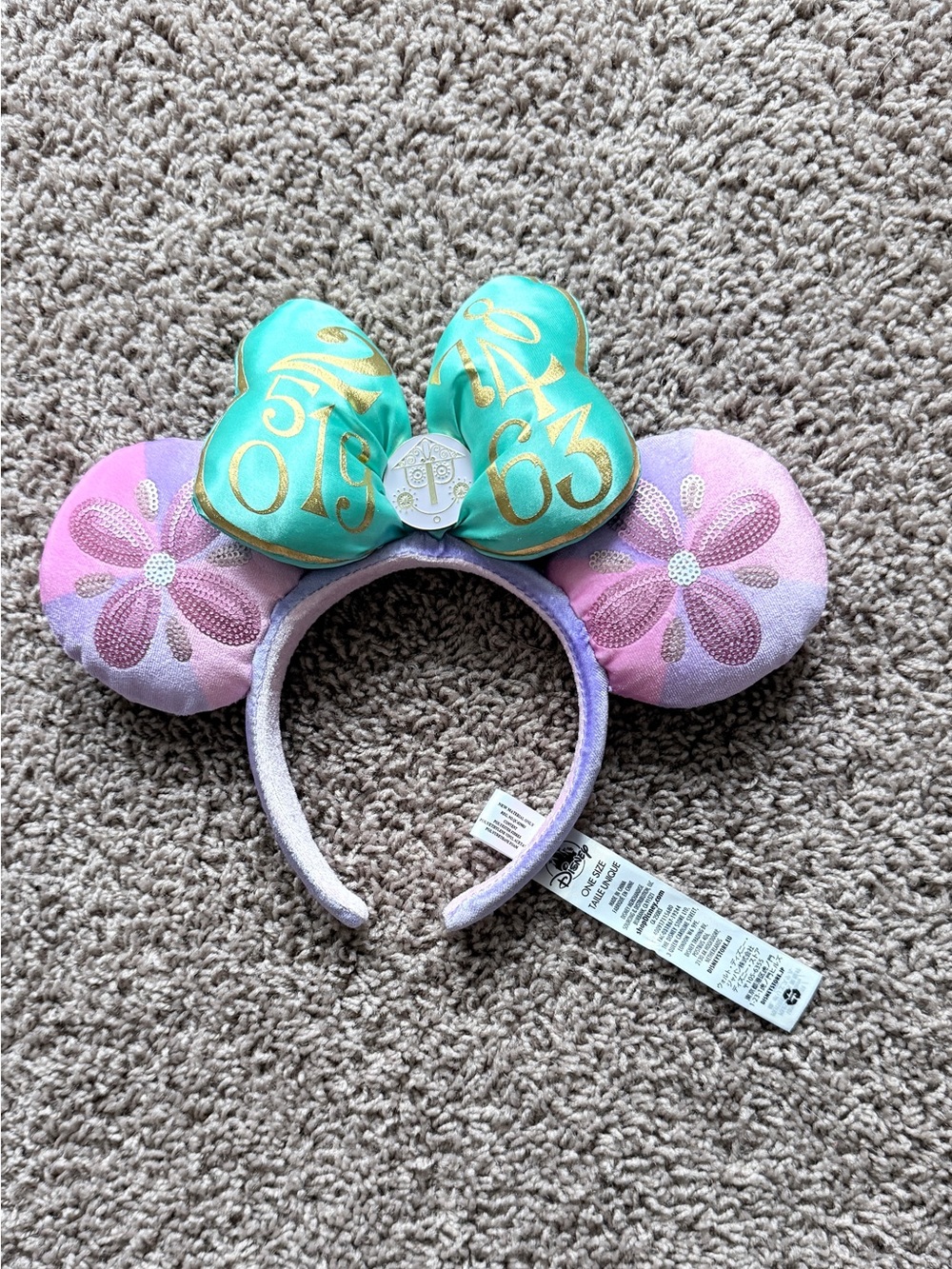 It's Small World Disney Minnie Mouse The Main Attraction Ears Headband Green Bow